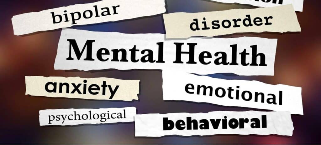 A collage of words related to mental health, including "bipolar," "anxiety," "emotional," and "behavioral," highlighting various psychological disorders.